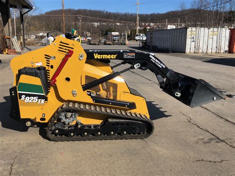 mini skid steer with backhoe|small stand on skid steer.